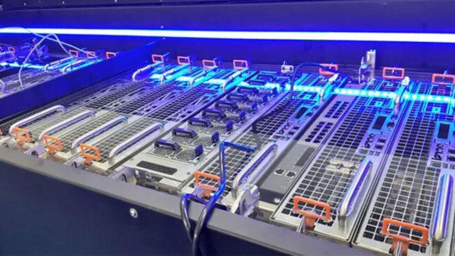 Row of data center servers with liquid cooling